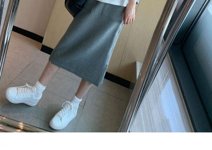Long-Sleeve Hoodie Paired with High-Rise A-Line Skirt