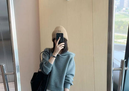 Long-Sleeve Hoodie Paired with High-Rise A-Line Skirt