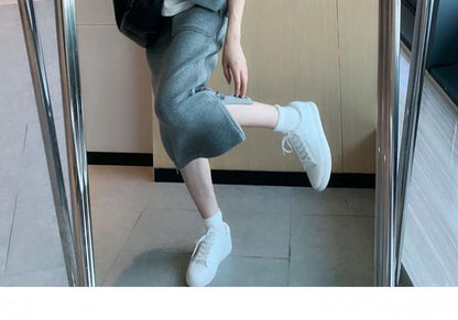 Long-Sleeve Hoodie Paired with High-Rise A-Line Skirt