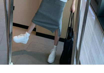Long-Sleeve Hoodie Paired with High-Rise A-Line Skirt