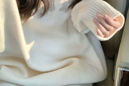 Pullover mit Rundhalsausschnitt und Schriftzug