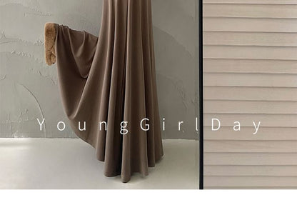 Crew Neck Long-Sleeve Tee Paired with High-Rise Solid Maxi A-Line Skirt