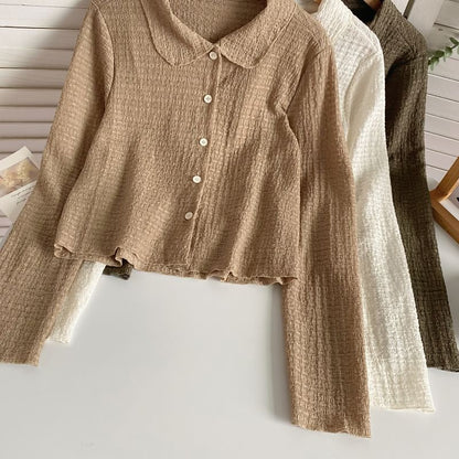 Langärmliges, schlichtes, gerafftes Hemd zum Zuknöpfen