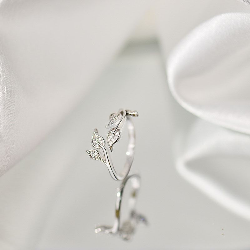 Bague ouverte en alliage avec branches et strass