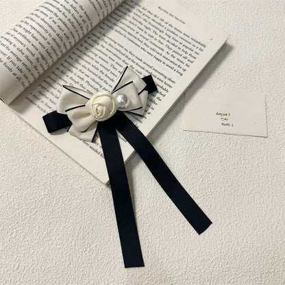 Faux Rose Pearl Bow Brooch