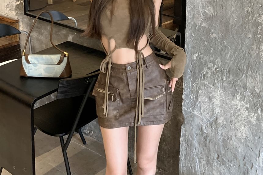 Sleeveless Round Neck Cutout Top / Mid Waist Faux Leather Mini Pencil Skirt