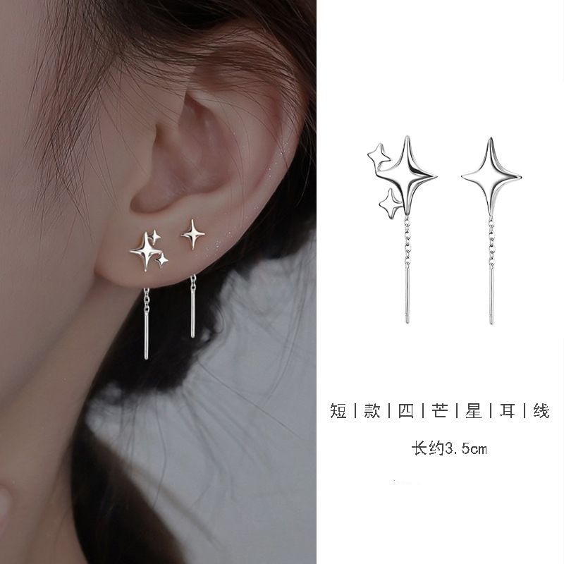 Boucle d'oreille asymétrique en alliage avec étoile