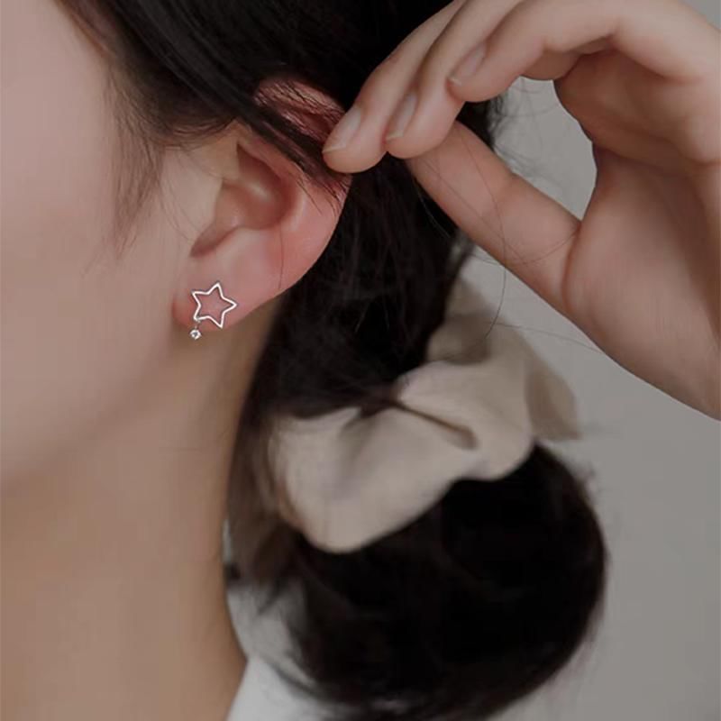 Boucles d'oreilles pendantes en alliage en forme d'étoile