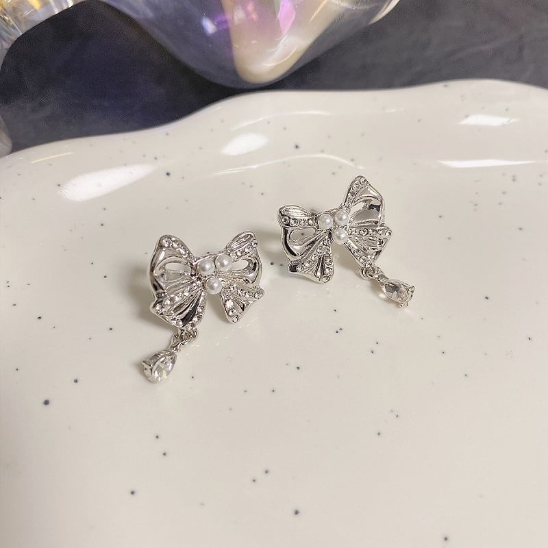 Boucles d'oreilles pendantes en alliage avec fausses perles et nœud