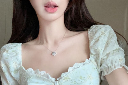 Short-Sleeve Square Neck Embroidered Eyelet Tie Front Blouse / High Rise Tiered Lace Mini A-Line Skirt