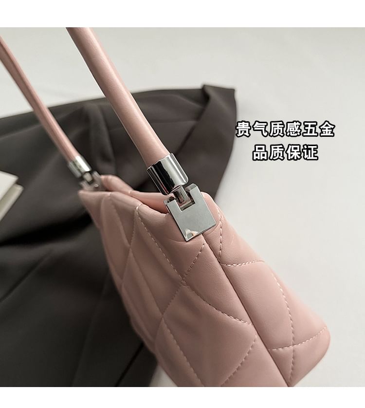 Quilted Twisted Bucket Bag