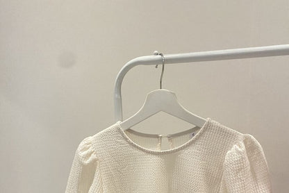 Haut gaufré uni à manches courtes et col rond