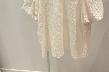 Haut gaufré uni à manches courtes et col rond