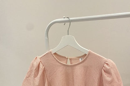 Haut gaufré uni à manches courtes et col rond