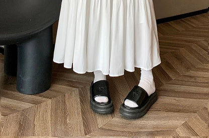 Einfarbiger Midirock in A-Linie mit hoher Taille und Rüschen