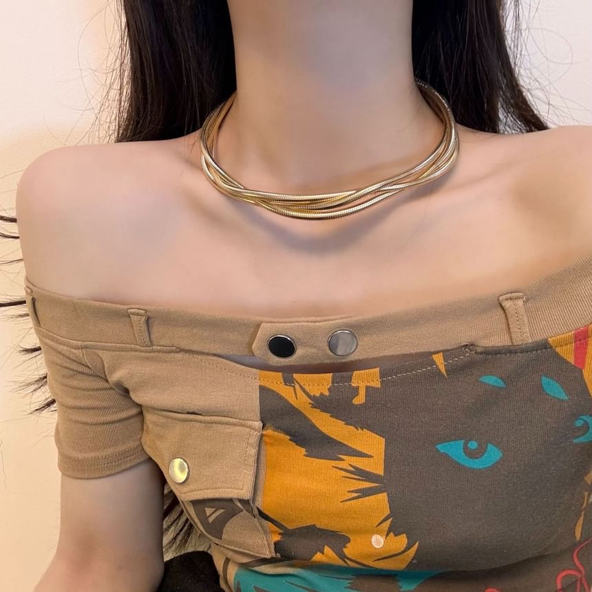 Layered Alloy Choker