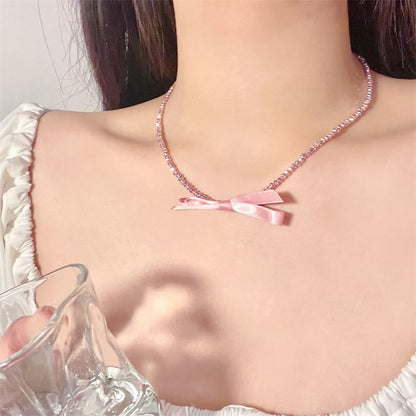 Beaded Necklace With Bow Pendant