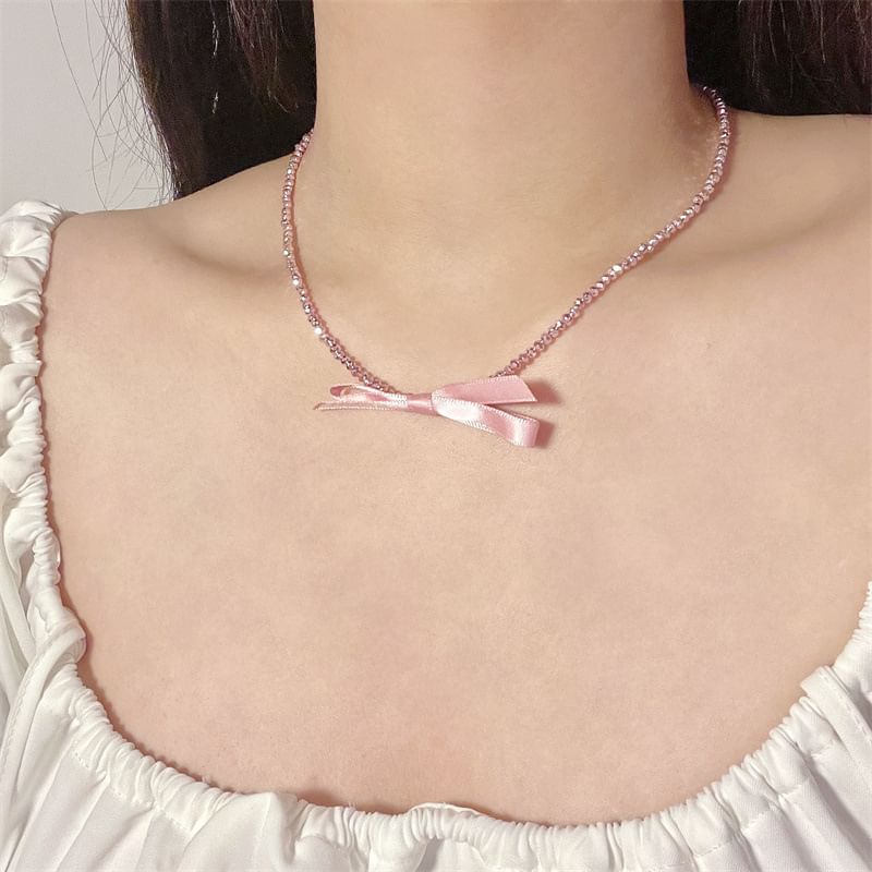 Beaded Necklace With Bow Pendant
