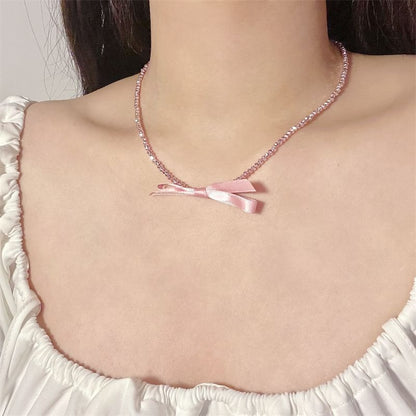 Beaded Necklace With Bow Pendant