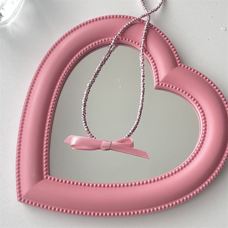 Beaded Necklace With Bow Pendant