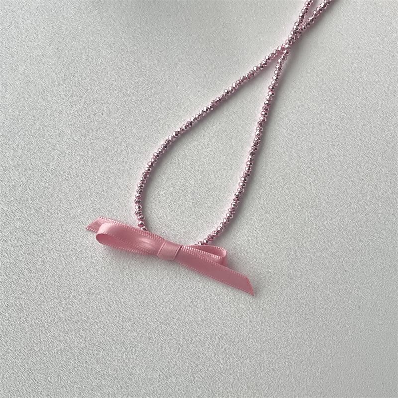 Beaded Necklace With Bow Pendant