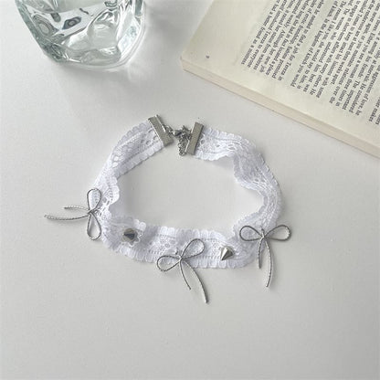 White Lace Choker Necklace With Bow And Spike Rivets