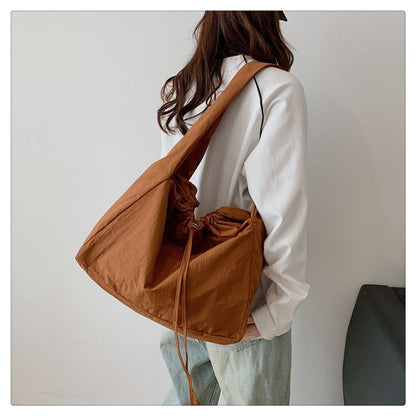 Sac bandoulière uni avec cordon de serrage