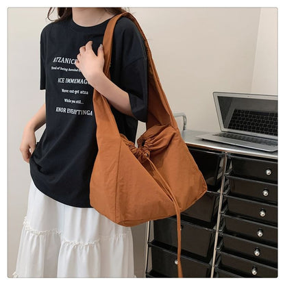 Sac bandoulière uni avec cordon de serrage