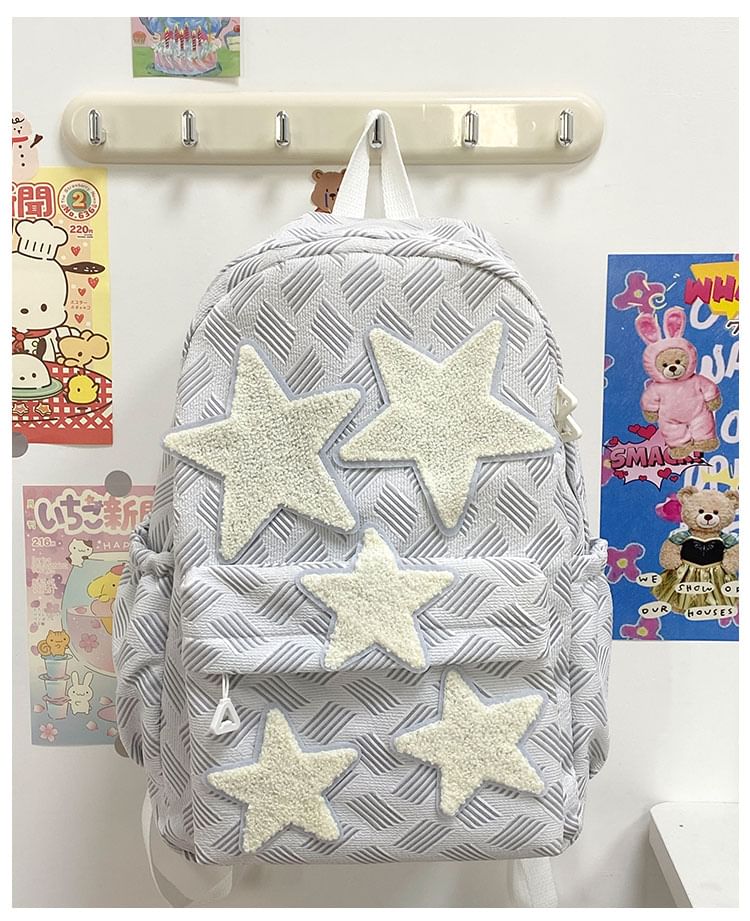 Sac à dos en nylon à fermeture éclair avec appliques en forme d'étoile