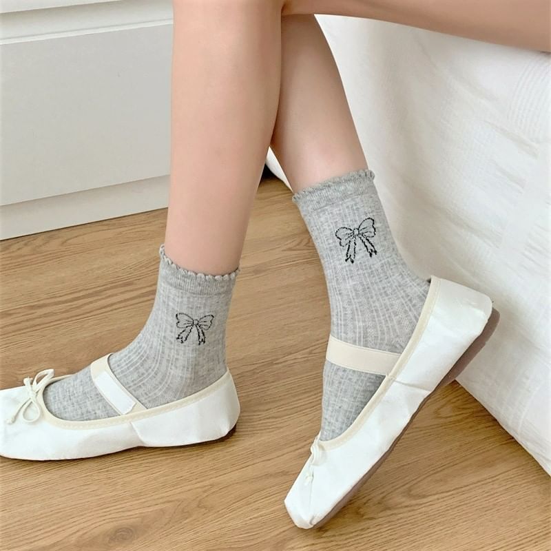 Socken mit Schleifen-Print