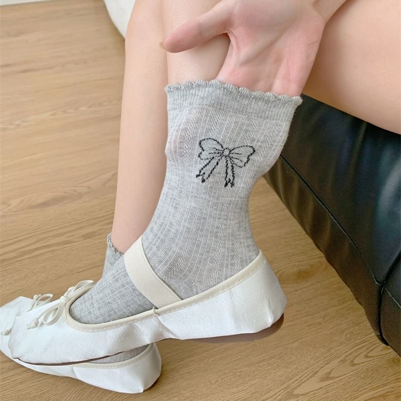 Socken mit Schleifen-Print