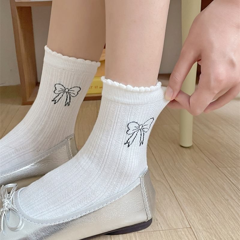 Socken mit Schleifen-Print