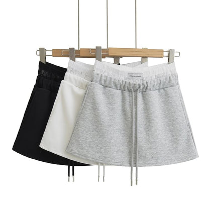 Paneled High-Waist A-Line Mini Skirt