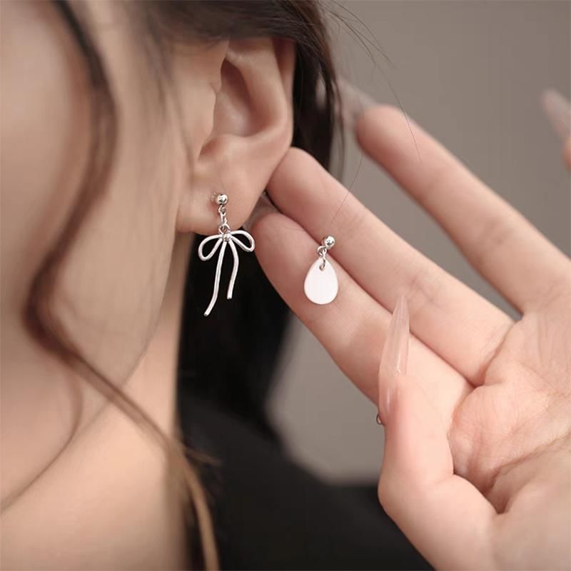 Boucles d'oreilles pendantes asymétriques en argent sterling 925 avec nœud