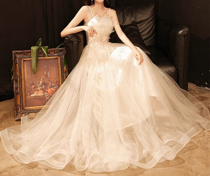 Spaghetti Strap Notch Neck Sequin Floral Accent Mesh A-Line Evening Gown