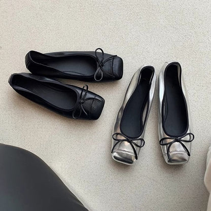 Cap Toe Bow Low Heel Pumps