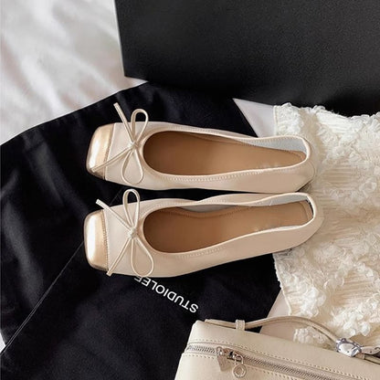 Cap Toe Bow Low Heel Pumps
