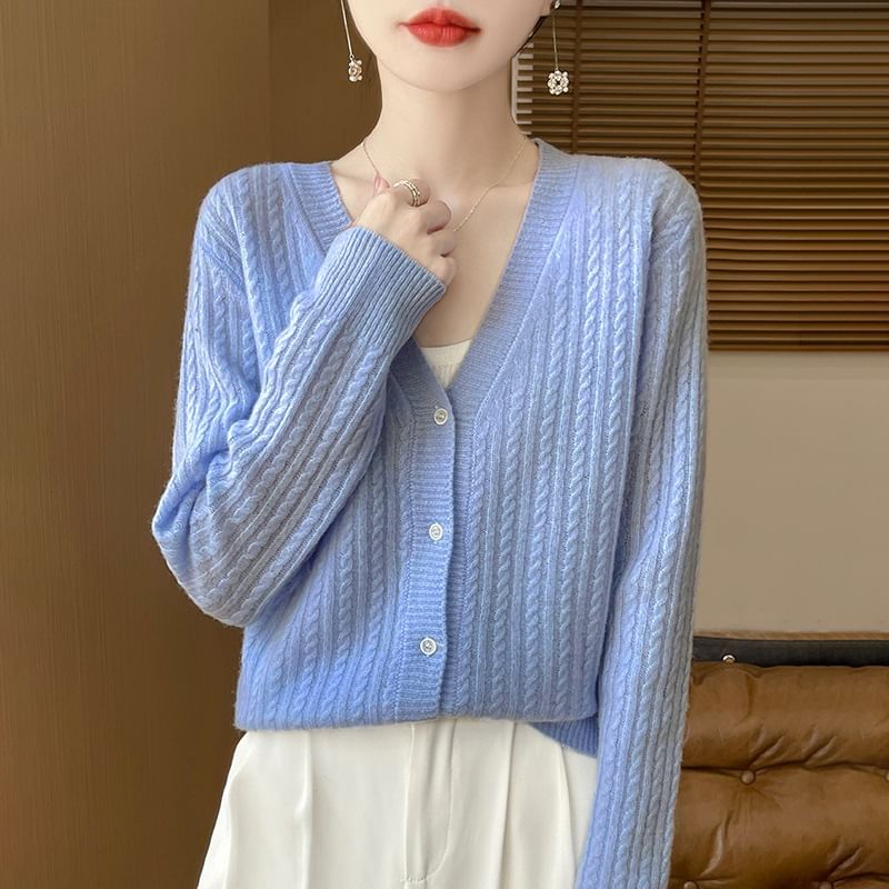 Cardigan en maille torsadée à col en V