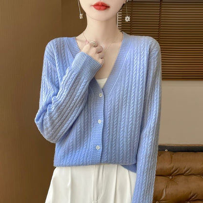 Cardigan en maille torsadée à col en V