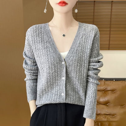 Cardigan en maille torsadée à col en V