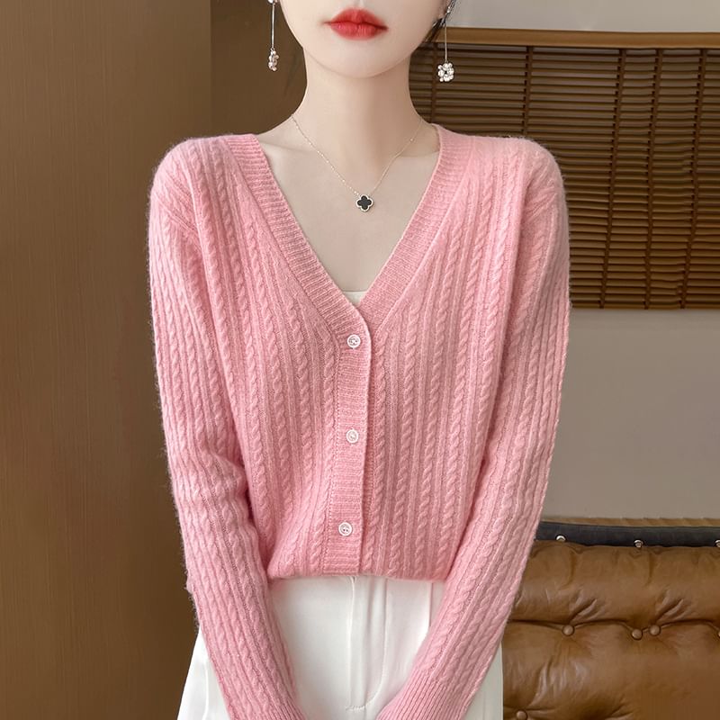 Cardigan en maille torsadée à col en V