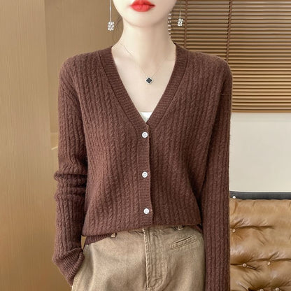 Cardigan en maille torsadée à col en V