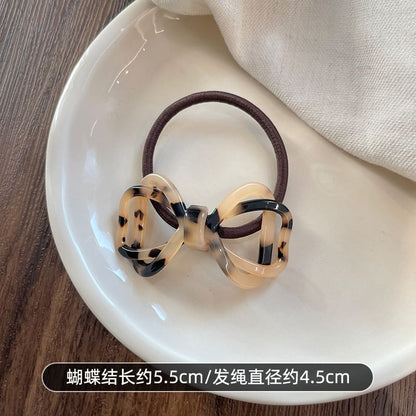 Noeud papillon pour cheveux