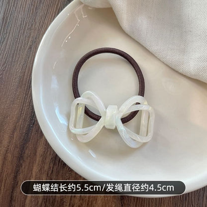 Noeud papillon pour cheveux