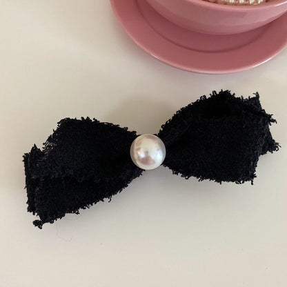 Pince à cheveux avec nœud en fausses perles