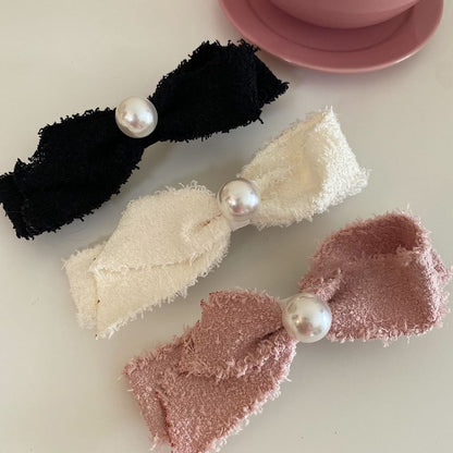 Pince à cheveux avec nœud en fausses perles