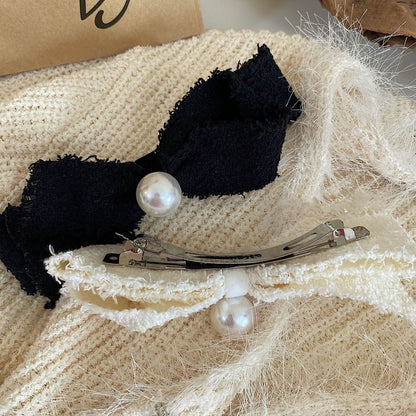 Pince à cheveux avec nœud en fausses perles