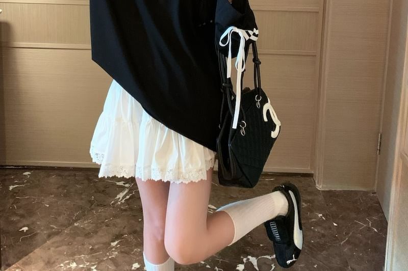 Mid Rise Solid Flared Mini Skirt
