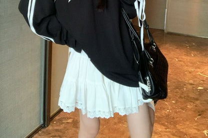 Mid Rise Solid Flared Mini Skirt