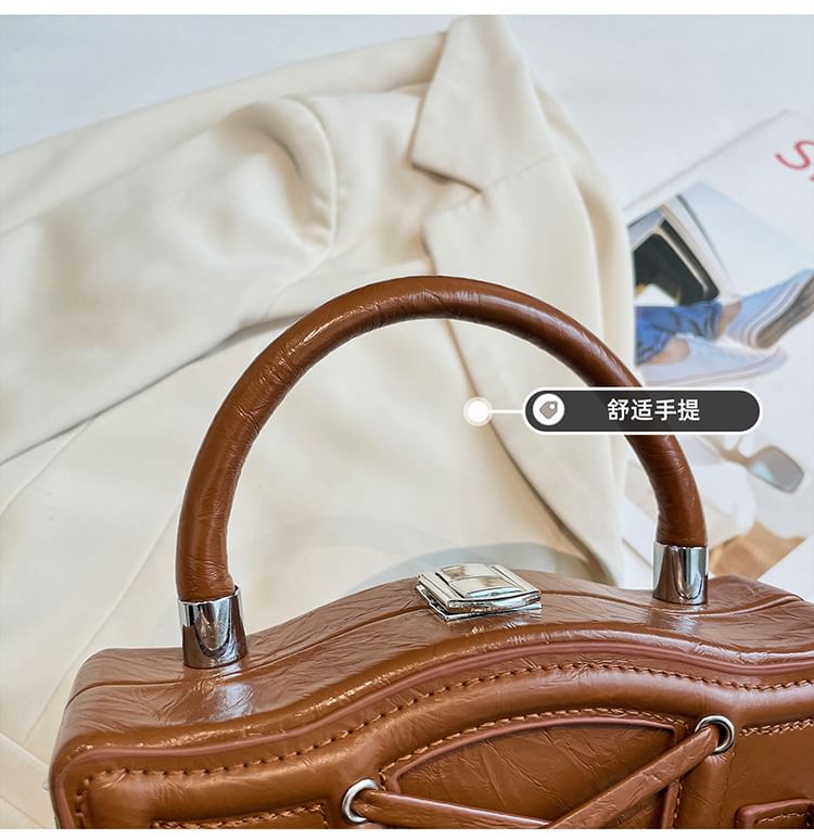 Buckled Lace-Up Crossbody Bag